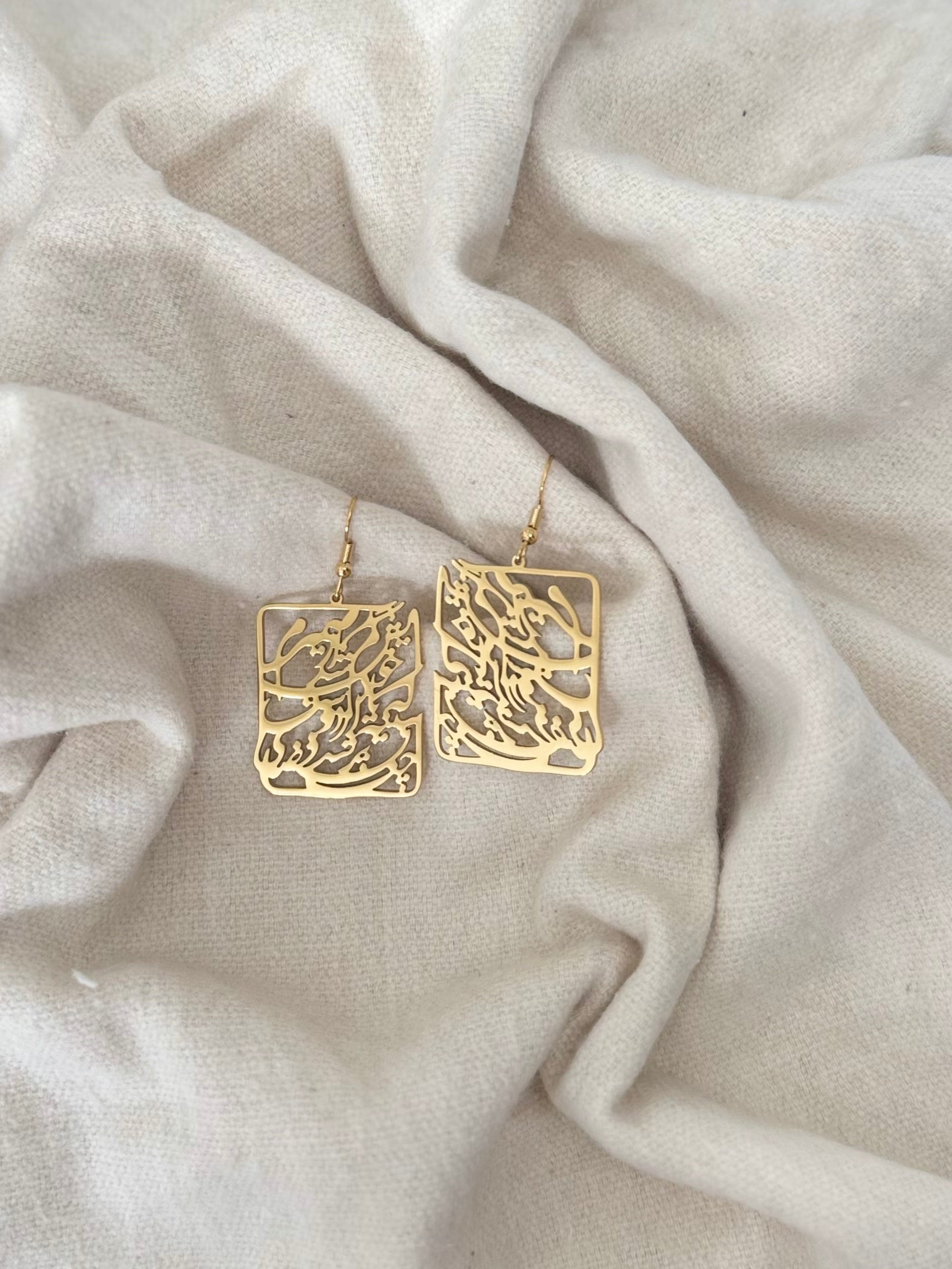 LENALIA Persian Calligraphy Earrings – close-up detail of handcrafted stainless steel jewellery