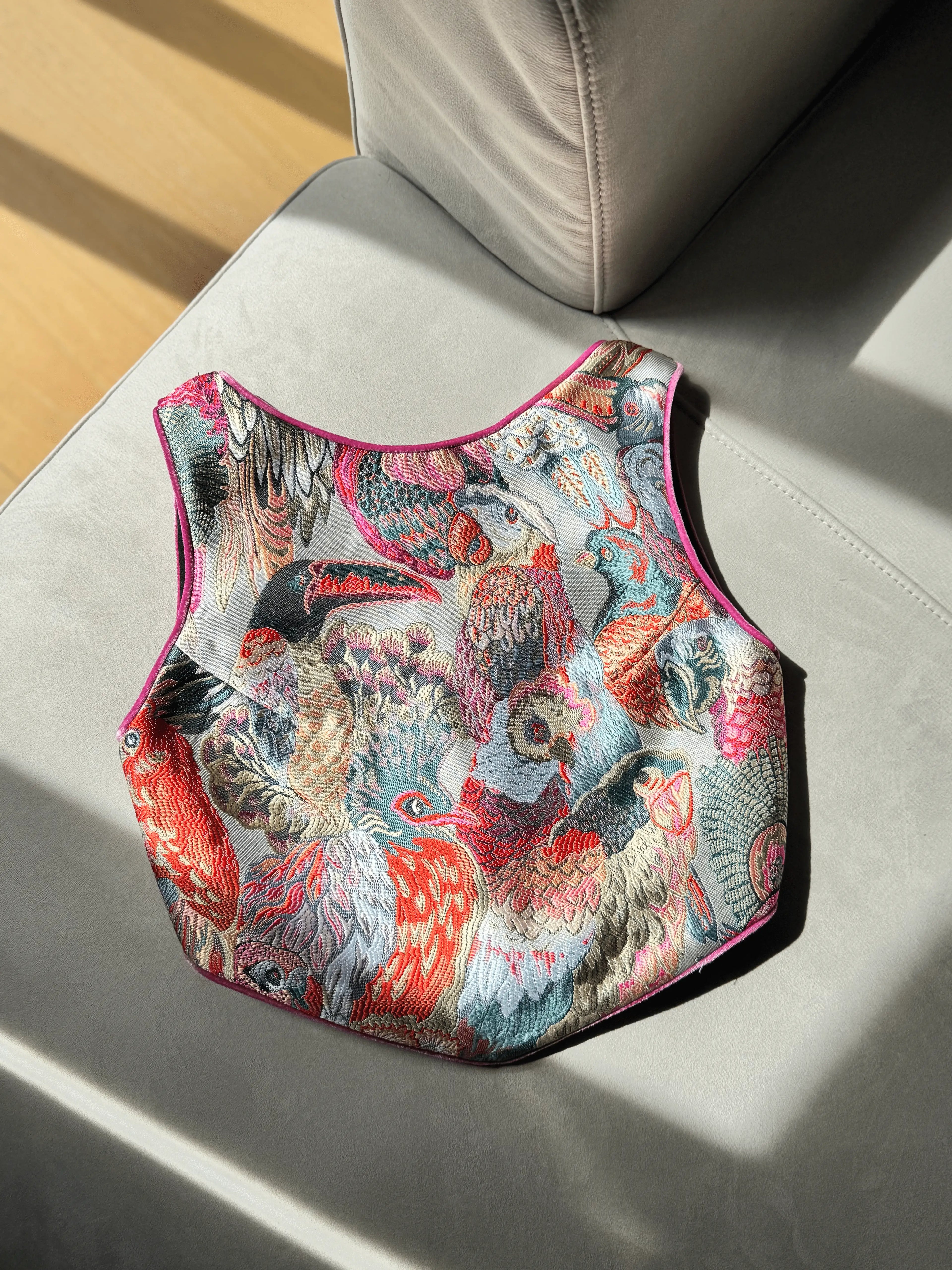 Colorful patterned bag on a light-colored surface